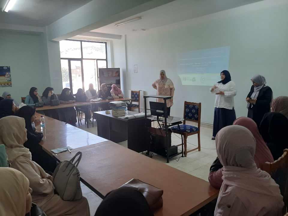 Female instructor in front of female attendees