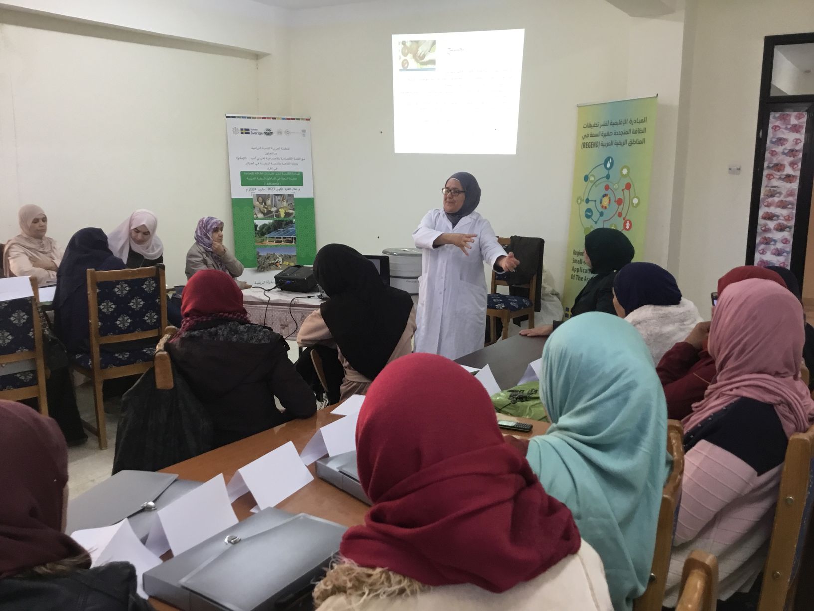 Speaker in front of rural women attendees