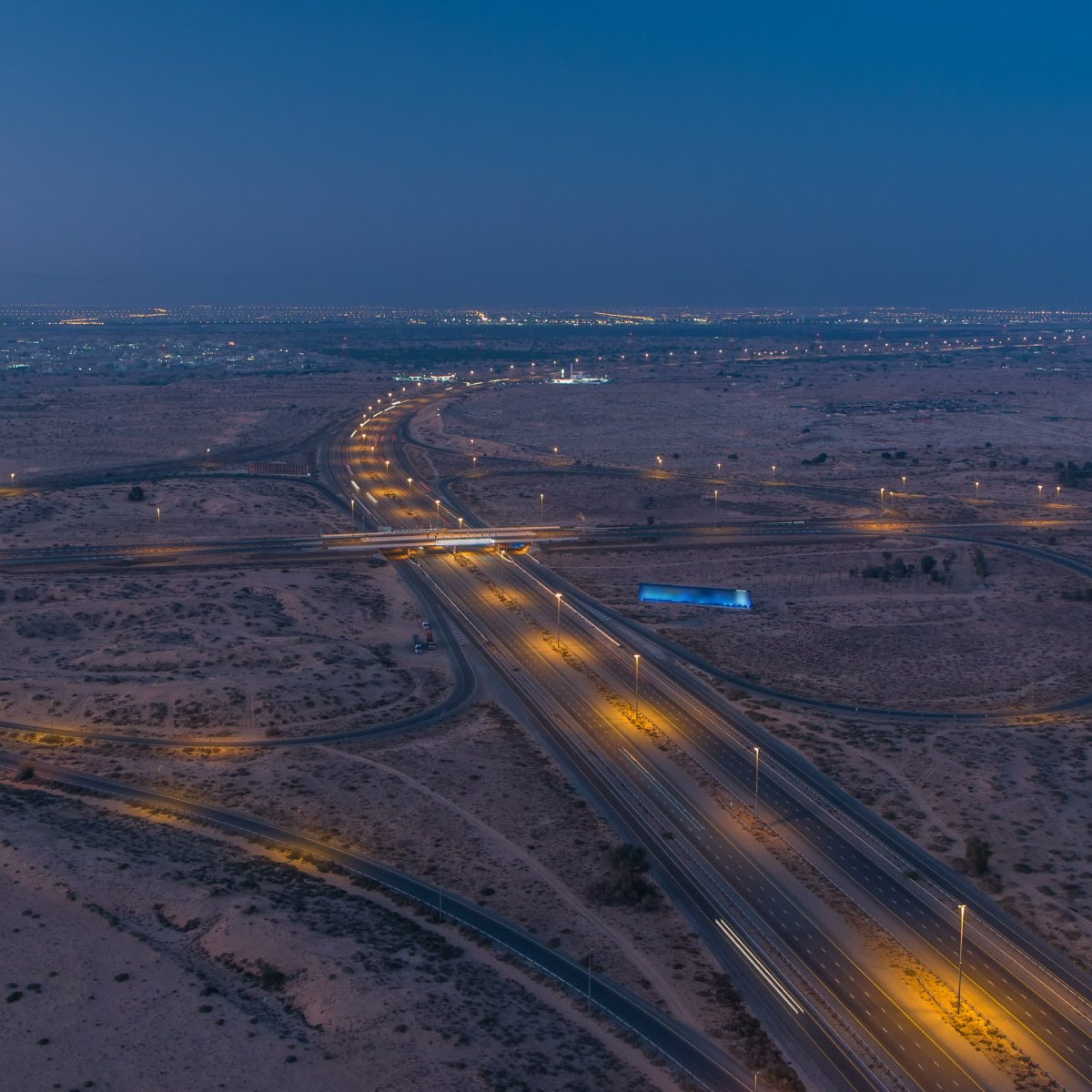 Highway roads with traffic night to day timelapse in a big city