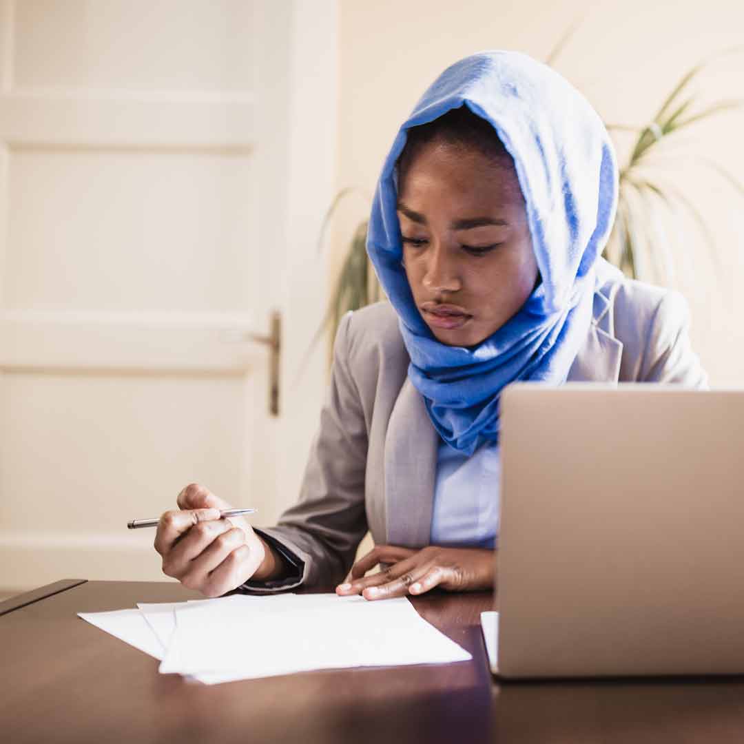 Woman using a laptop. Photo: iStock