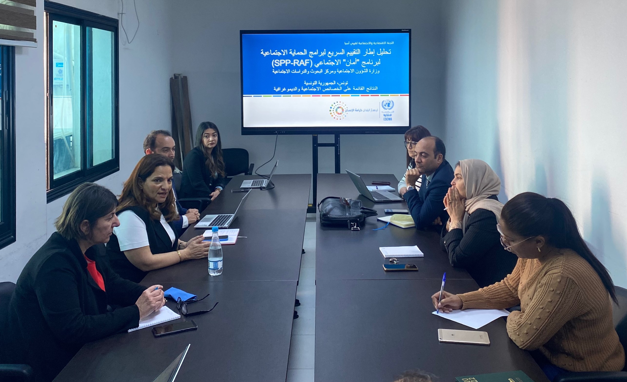 Participants around a meeting table