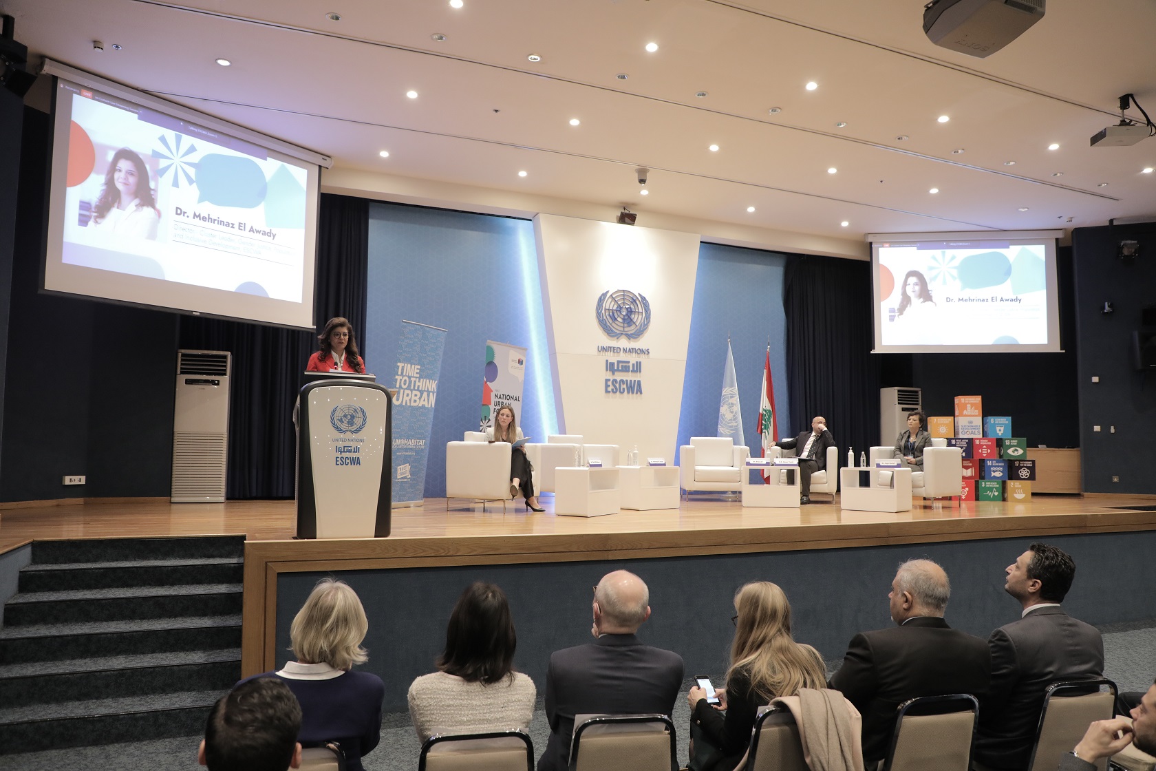 Speakers on stage during the opening of the Forum