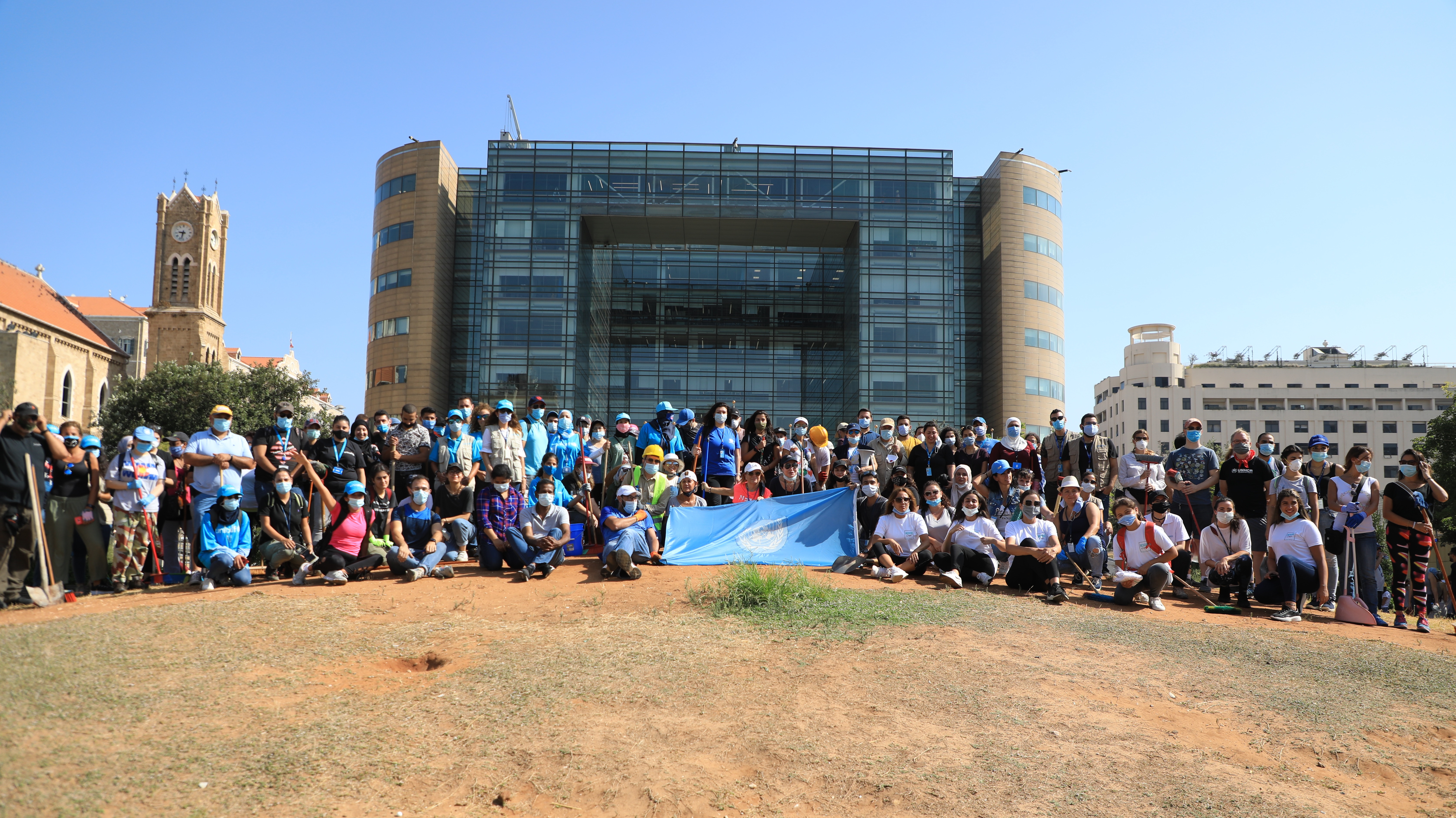 A group of UN staff members in front of the UN House in Beirut