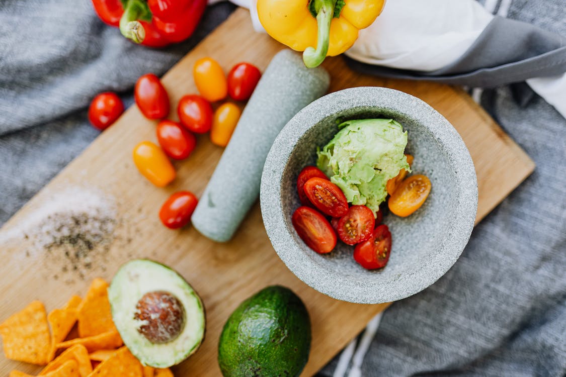 Tomatoes and Avocado in a Mortar