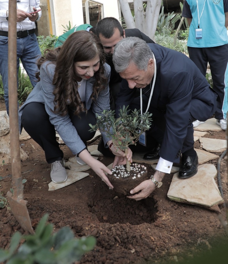 ESCWA and a delegation from the Mekhitarist Fathers School planting an olive tree in the garden of the organization