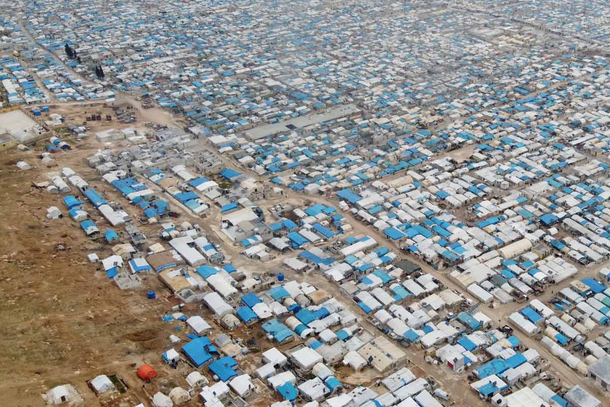 A temporary settlement in Syria on the border with Turkey, 2020. Photo: Ahmet Akpolat/iStock