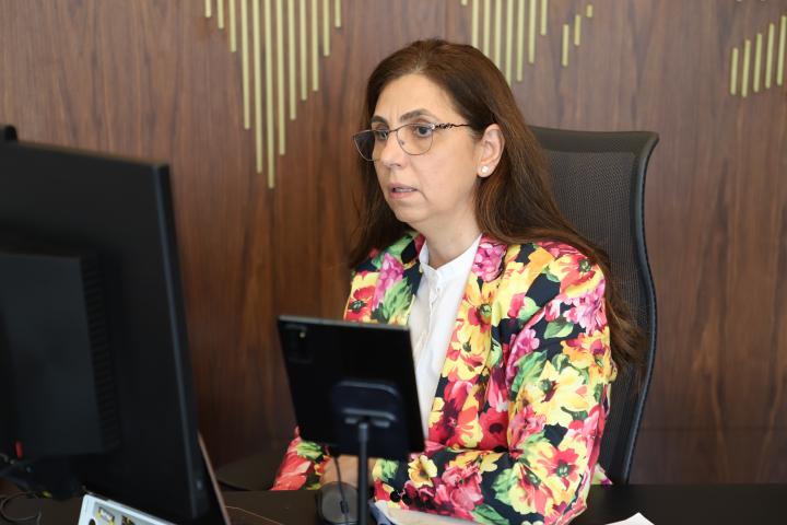 Executive Secretary Rola Dashti at her desk