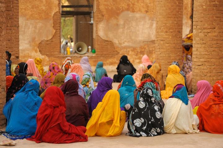 Women sitting on the ground