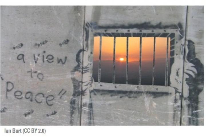 A view to peace, seen from a barred window