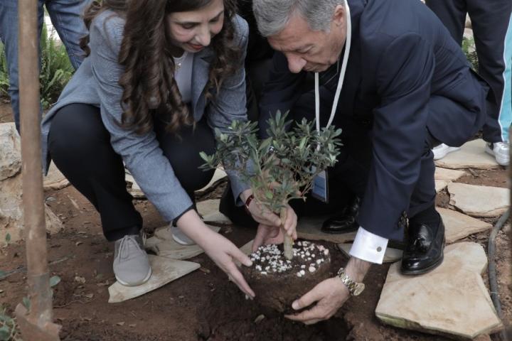 ESCWA and a delegation from the Mekhitarist Fathers School planting an olive tree in the garden of the organization