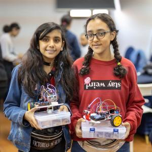 Two young electronics enthusiasts. Photo: Emad Karim/UN Women