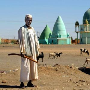 A man and goats in Sudan. Photo: iStock